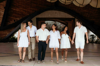 Photograph of a family group walking together in their luxury Mexican hotel, captured by a DreamArt photographer