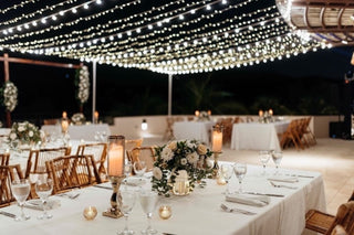 Photograph of a wedding dinner set up before the guests arrive. Captured by a DreamArt photographer.
