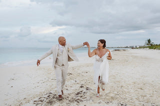 Wedding couple on beach at Mahekal beach resort during photographer photoshoot