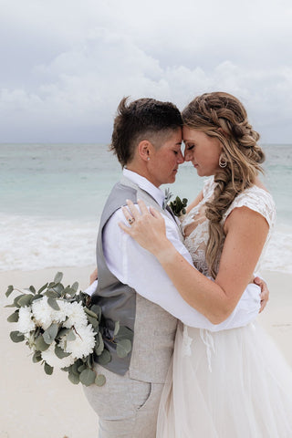 Wedding couple romantic moment on beach at Mahekal resort during photographer photoshoot
