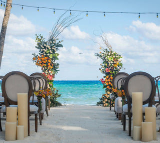 Mahekal Beach Resort wedding venue flowers decoration aisle on beach photographer photoshoot