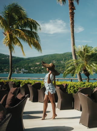 A woman enjoying a photoshoot with Secrets St. James Montego Bay photographers