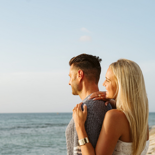 Engagement photoshoot with couple in front of the ocean at Breathless Montego Bay spa & resort in Jamaica