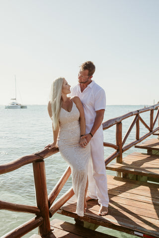 A couple enjoying a photoshoot from their favourite Mia Reef Isla Mujeres photographers