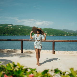 Model posing in front of sea with during boudoir lifestyle photoshoot in Montego Bay