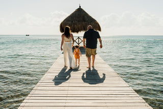 Family walking in the pier of Vidanta Riviera Maya