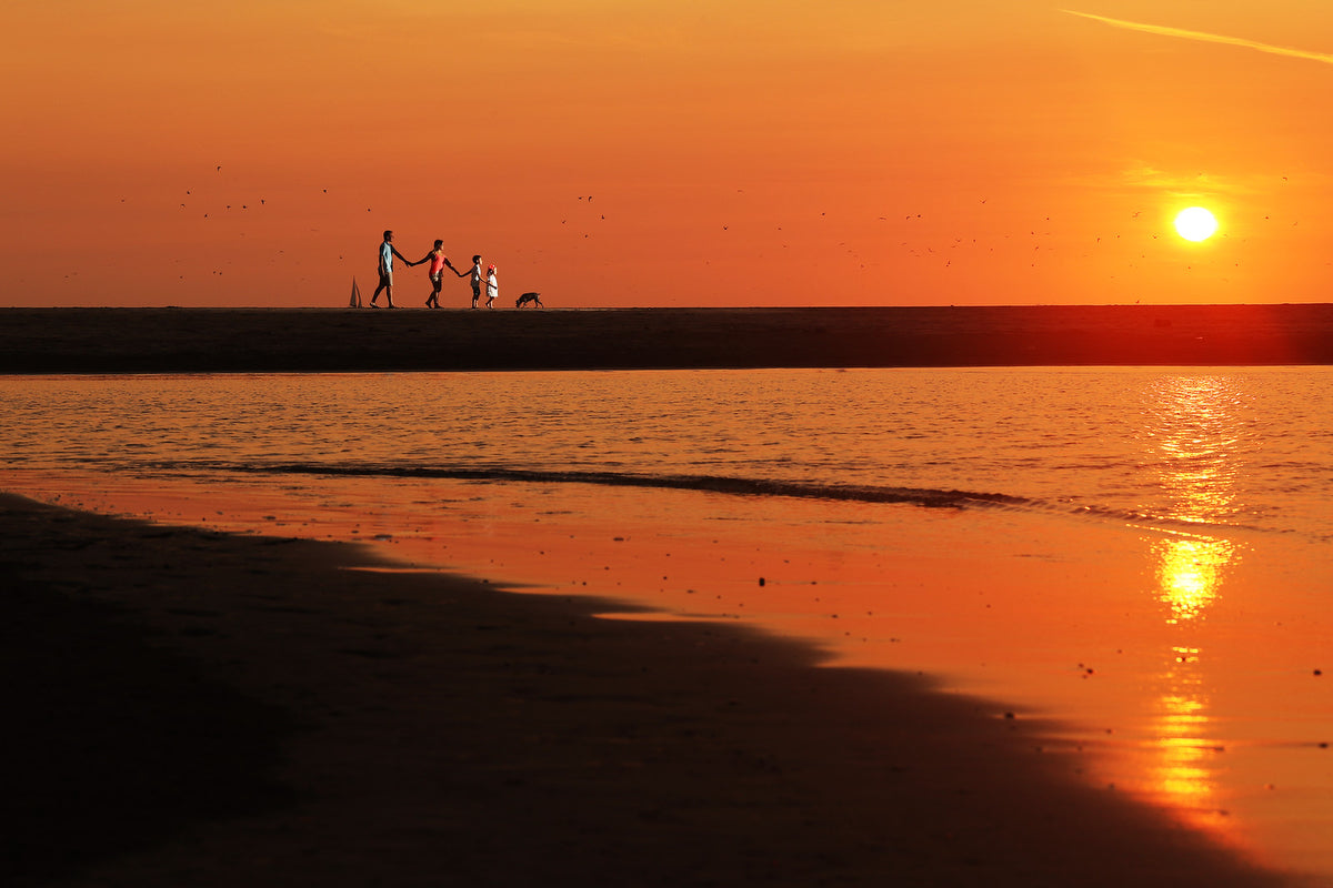 Family walking during the sunset in Vallarta