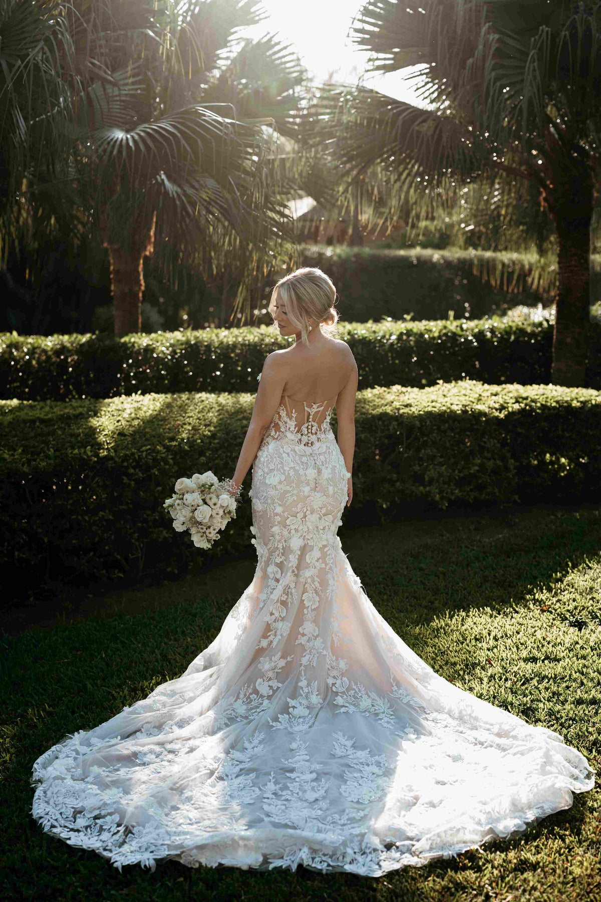 Photograph of bride in a mermaid dress, captured by a DreamArt Photographer