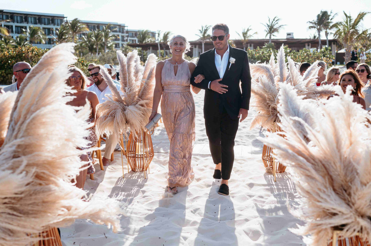 Photograph of the wedding ceremony set up of a beach wedding