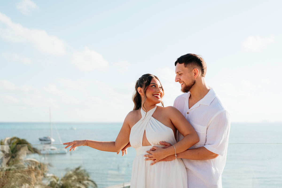 Couple enjoying their vacation with their Almare Isla Mujeres photoshoot with their DreamArt Photography