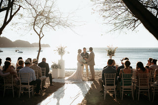 ceremony at the beach with beautiful sunset