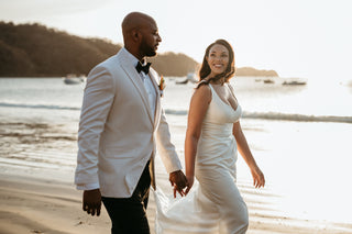 wedding couple happily at the beach 