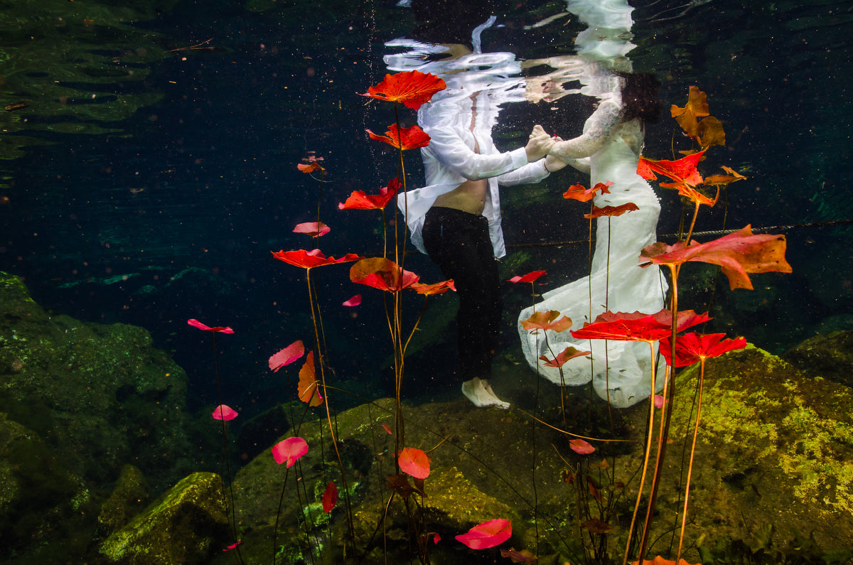 Underwater trash the dress at Chikin Ha Cenote