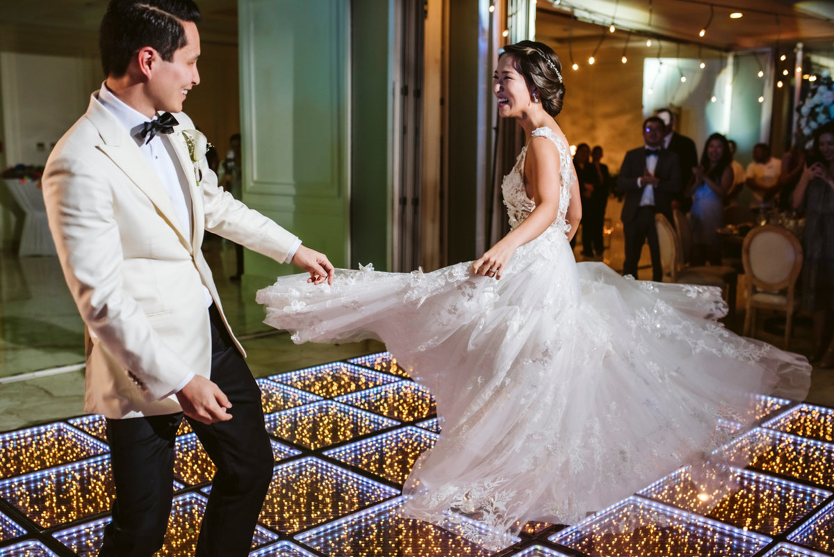 Newlyweds dancing in the reception at Grand Velas Riviera Maya