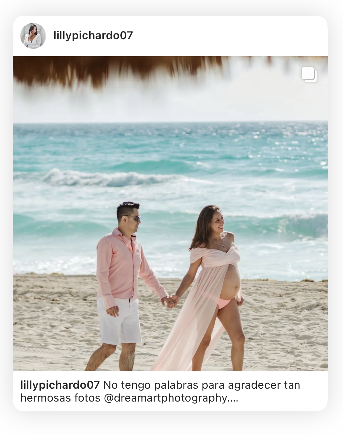 Instagram post of a pregnant woman and her partner walking the beach during a maternity photoshoot