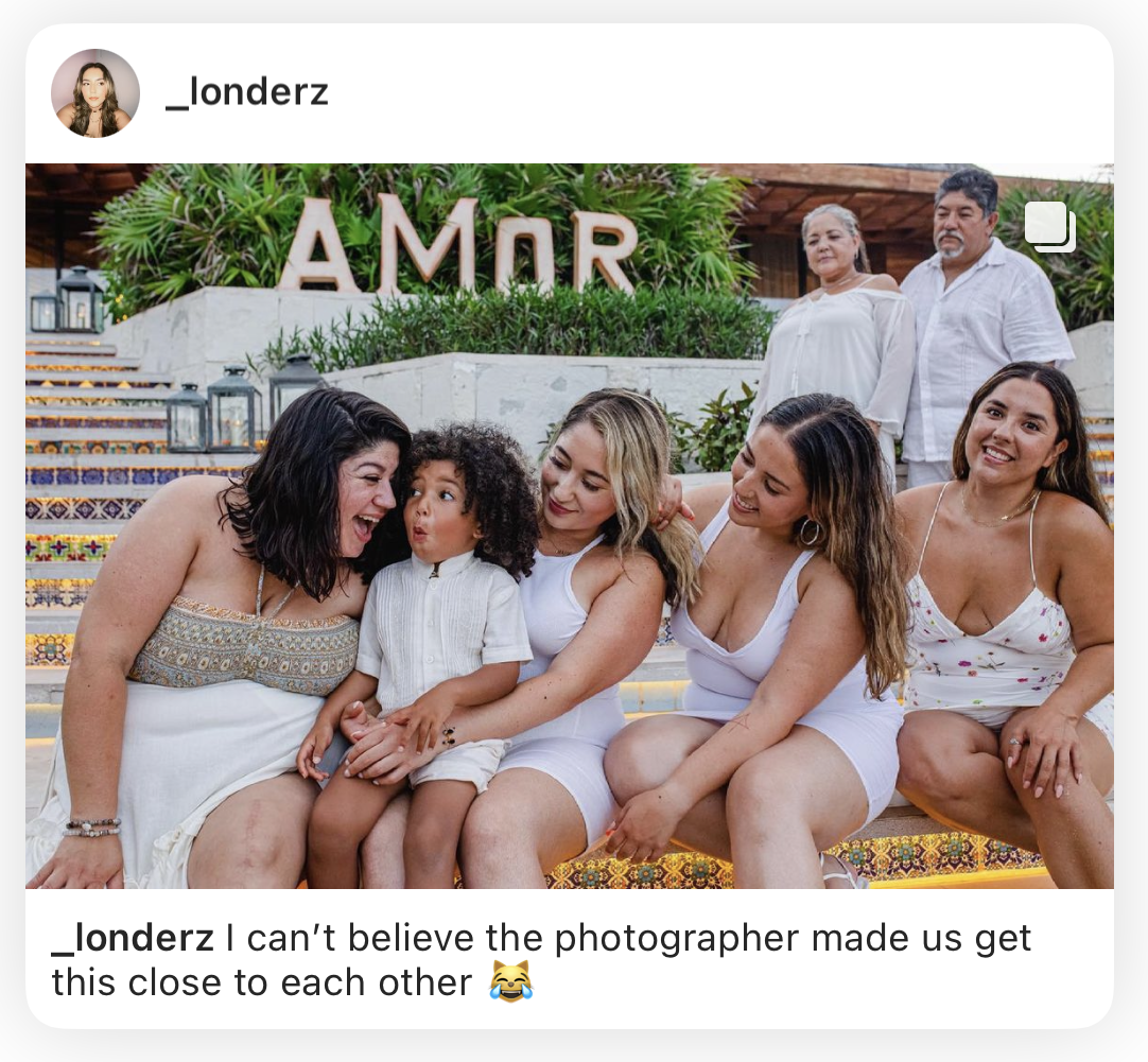 Instagram post of a family of women and a little boy laughing together on colorful tiled steps