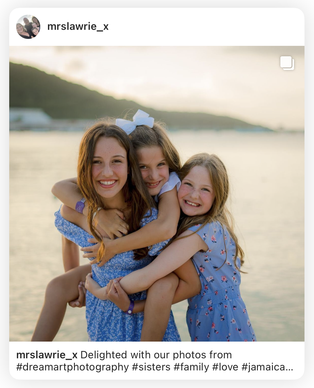 Client Instagram post of three smiling sisters hugging on the beach at sunset after their photoshoot