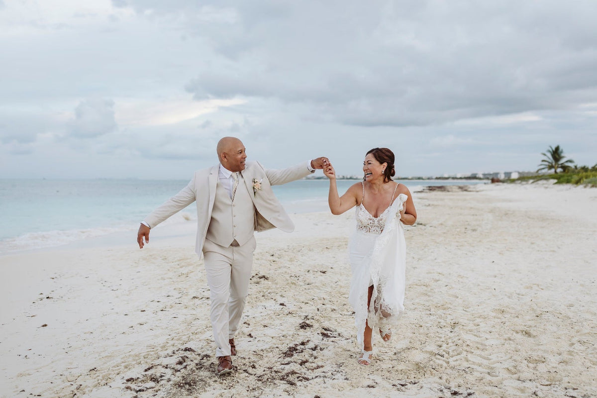 Wedding couple on beach at Mahekal beach resort during photographer photoshoot