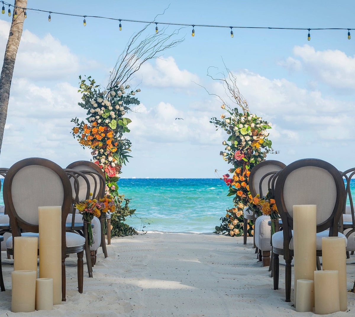 Mahekal Beach Resort wedding venue flowers decoration aisle on beach photographer photoshoot