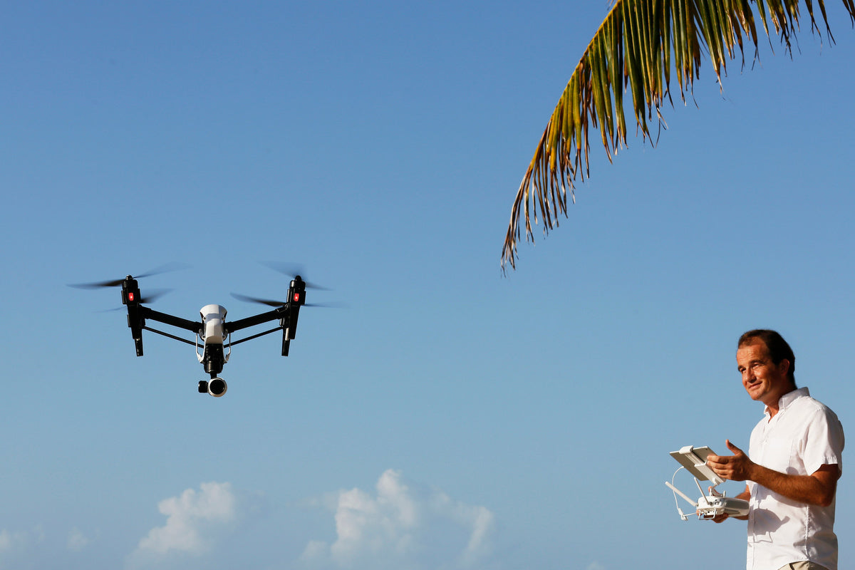 Our pilot Olivier flying the drone