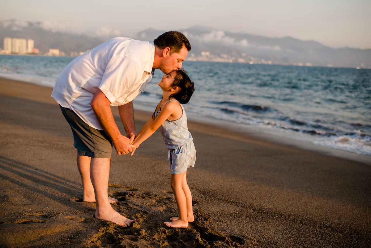 Family in the beach at puerto Vallarta