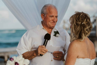 Image of man crying as he reads wedding vows, taken by a DreamArt photographer, used for blog about Summer Trends 2025  
