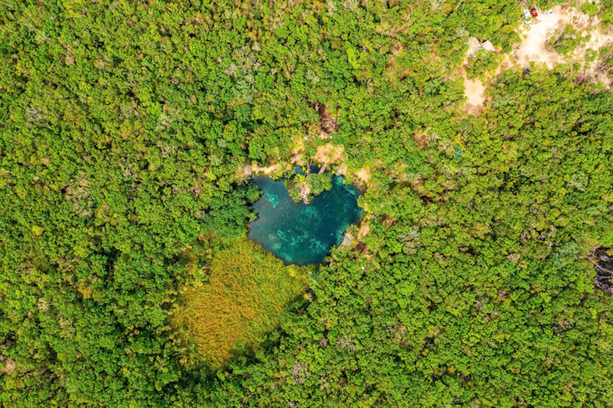 Drone Shot of cenote corazon in Tulum