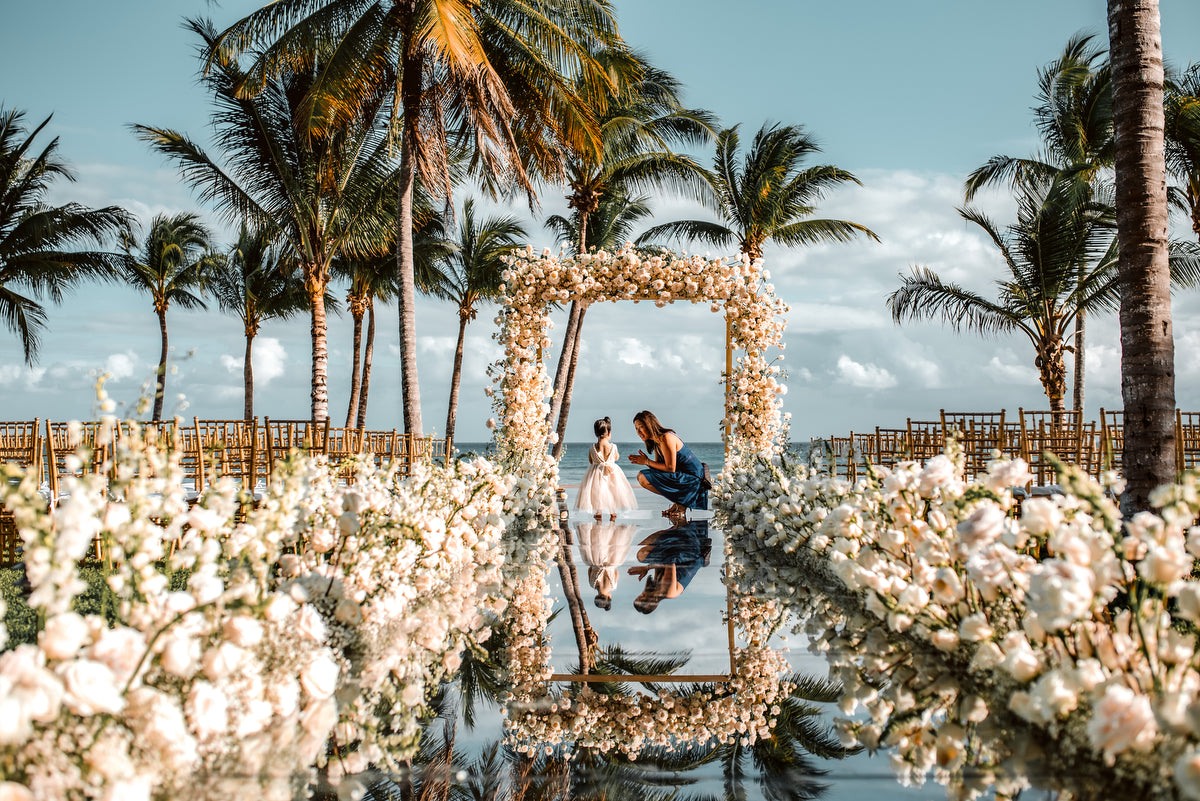 Aisle full of flowers with a mirror in a Wedding at Grand Velas Riviera Maya