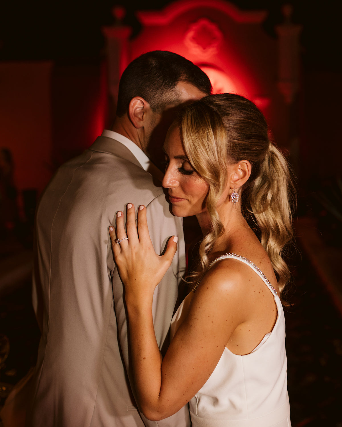 Bride and groom slow dancing during their wedding reception at Valentin Imperial Riviera Maya, Mexico