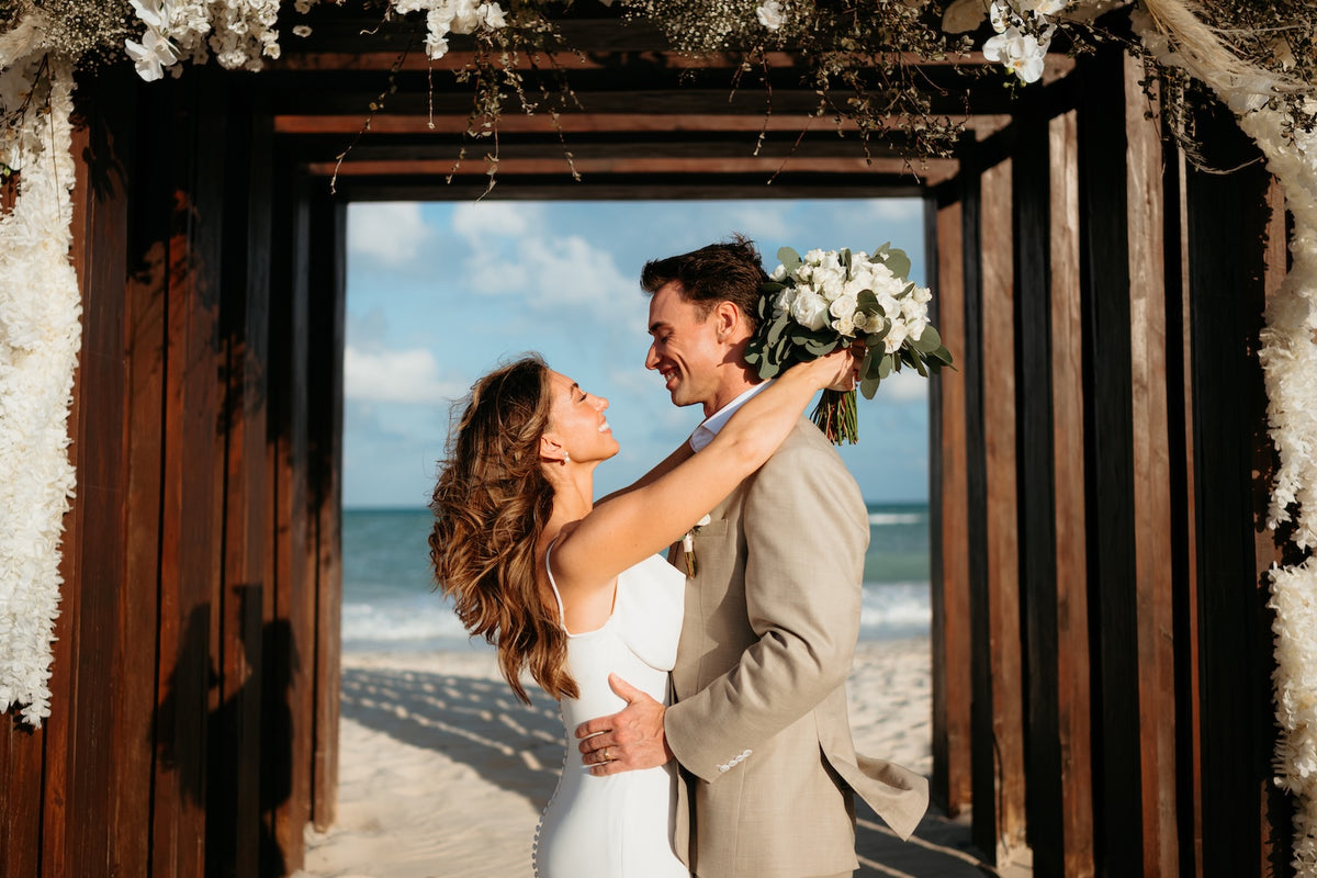 wedding couple at beach gazebo