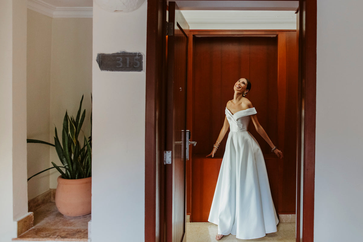 bride smiling in her dress