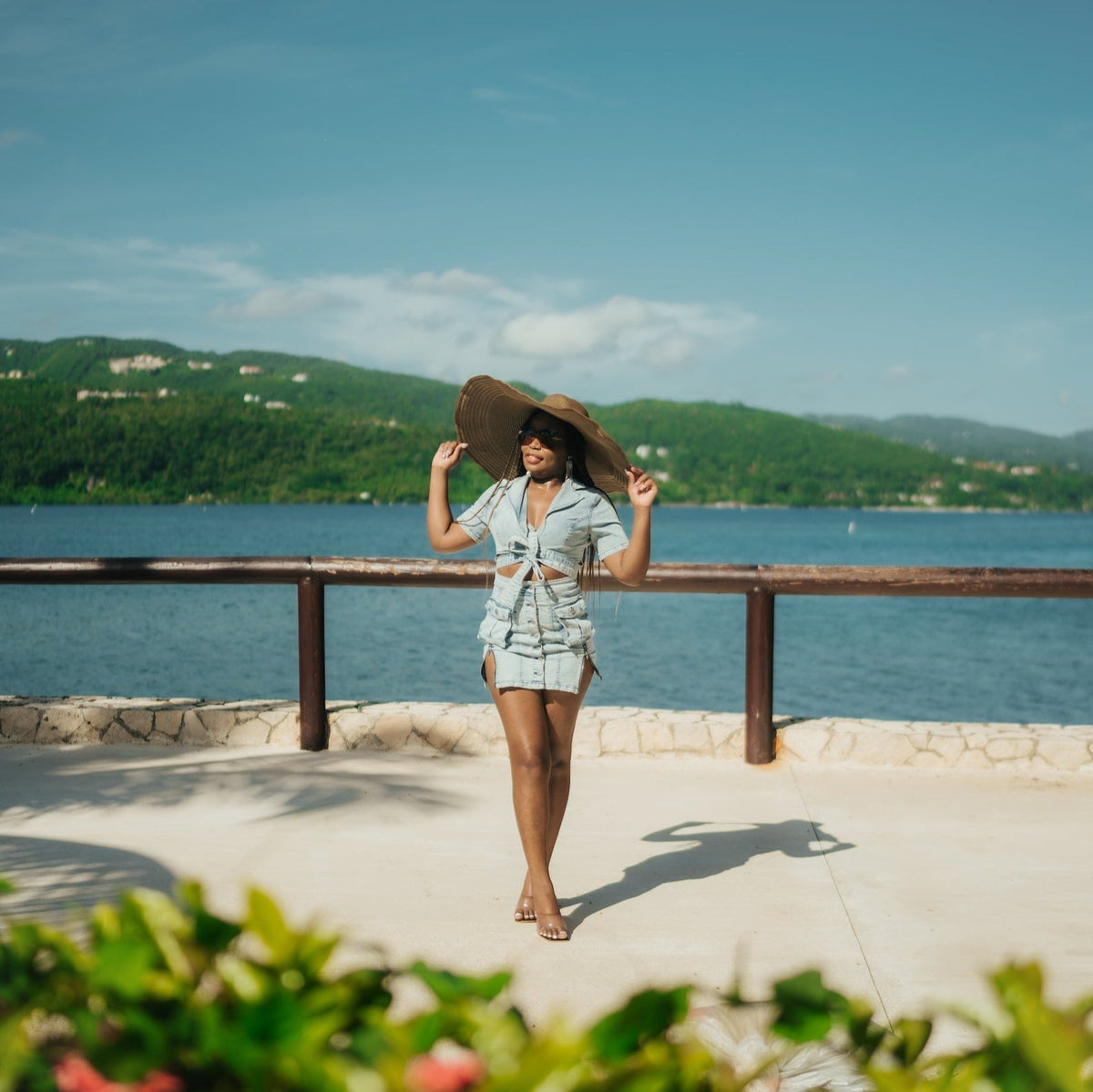 Model posing in front of sea with during boudoir lifestyle photoshoot in Montego Bay