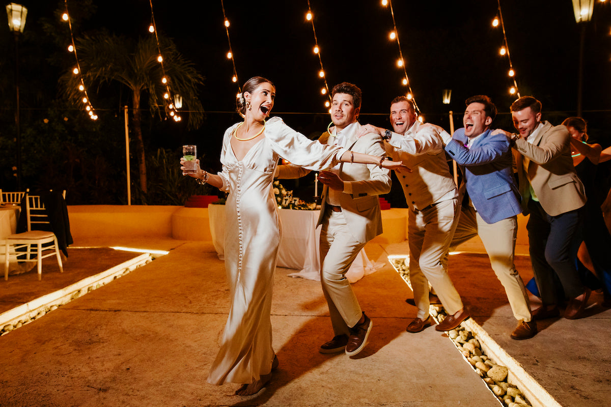bride leads dance train