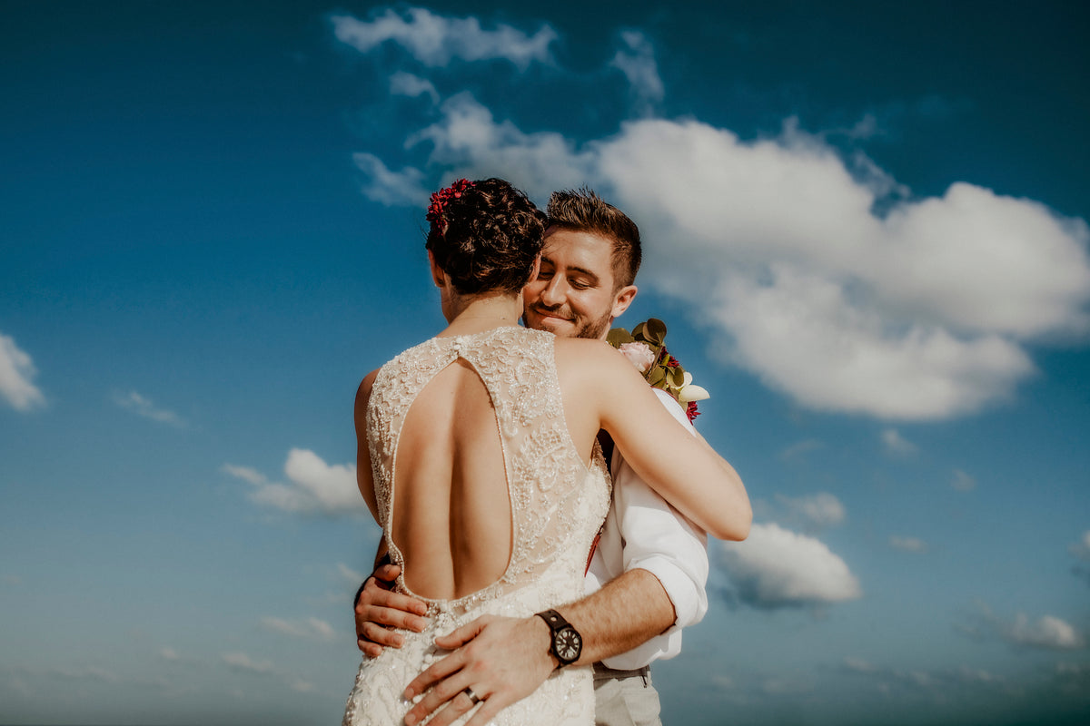 Romantic couple during wedding photography photoshoot on beach at viceroy riviera maya a luxury hotel resort