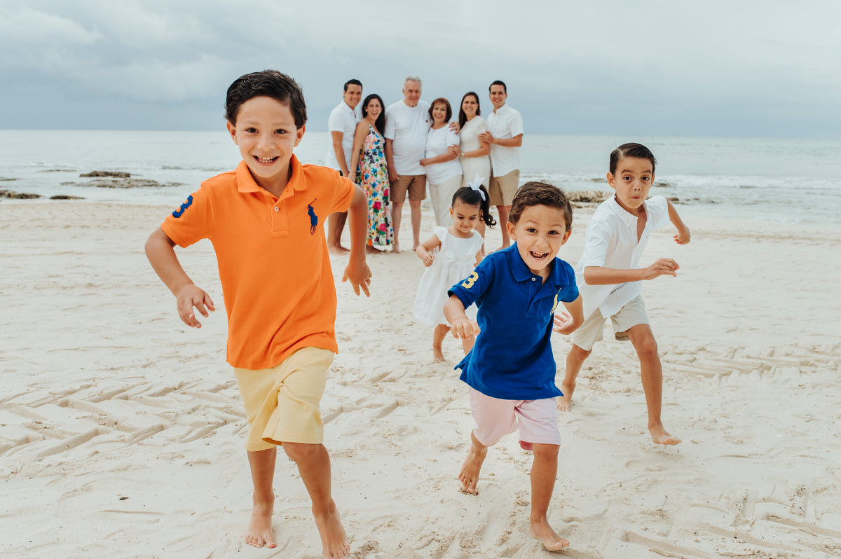 Kids running in a photo session at Vidanta Riviera Maya
