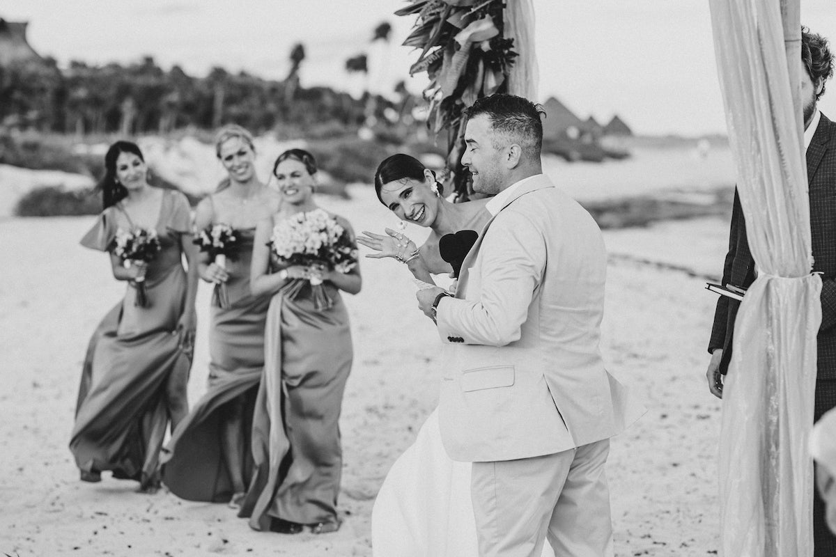 bride waving at the camera